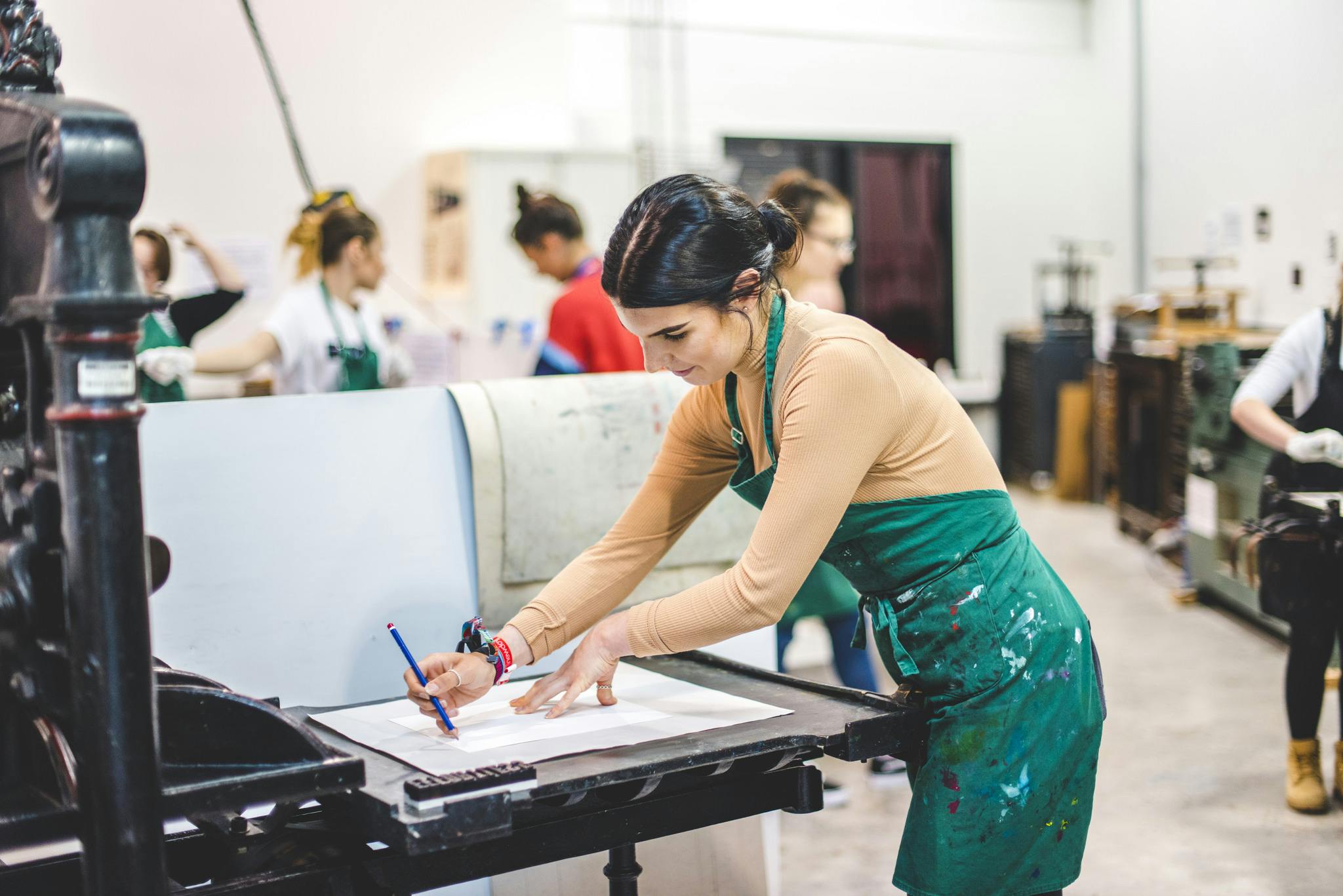 Plymouth College of Art student in printing studio