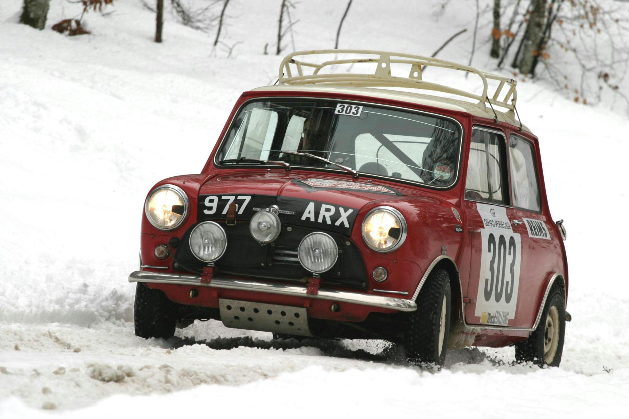 The Mini Cooper of Peter Barker and Willy Cave negotiate the ice and snow of the Rallye Monte Carlo Historique in 2008
