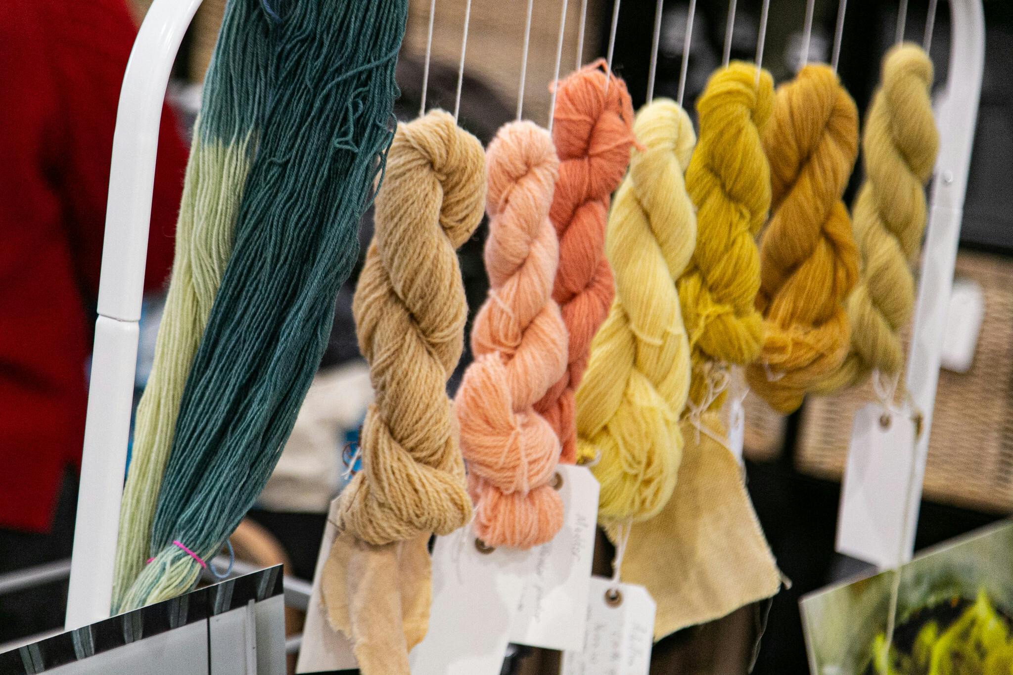 Twisted skeins of wool dyed with natural colours