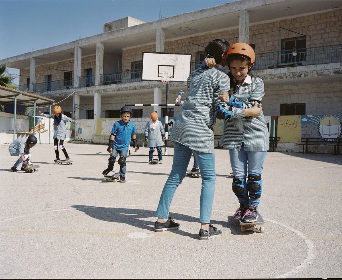 Young people learning to skate on the West Bank of Palestine during artist Dani Abulhawas visit Photo by Christan Nilsen