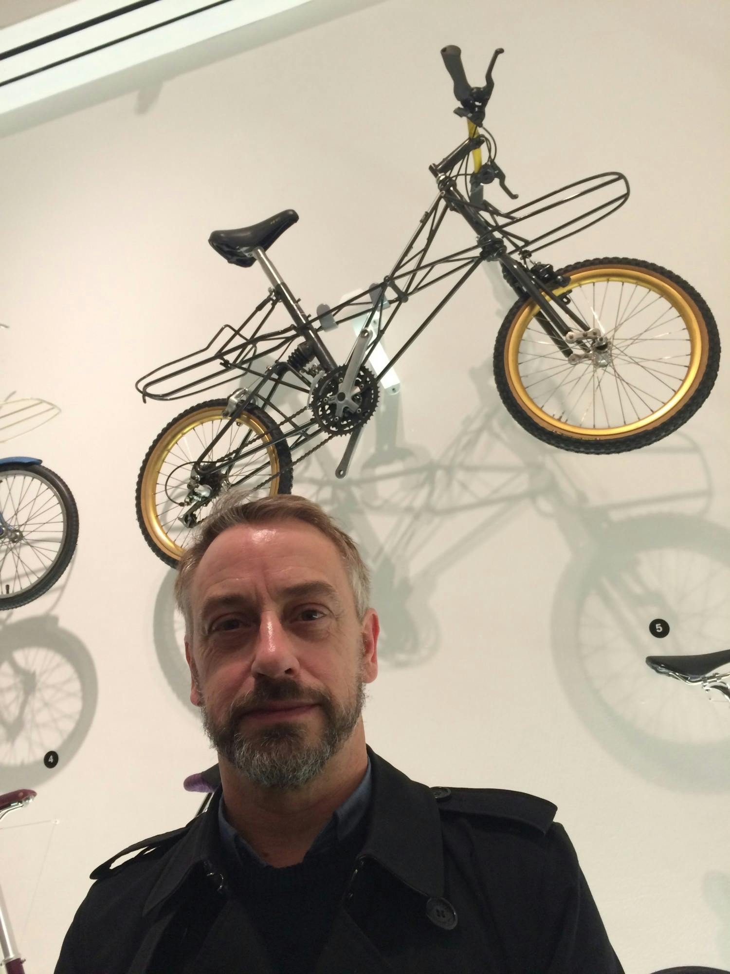 Peter Barker with the the 1987 AM ATB Alex Moulton All Terrain Bicycle at the Design Museum in 2015 the 1987 AM ATB was designed by Alex Moulton with assistance by Peter Barker