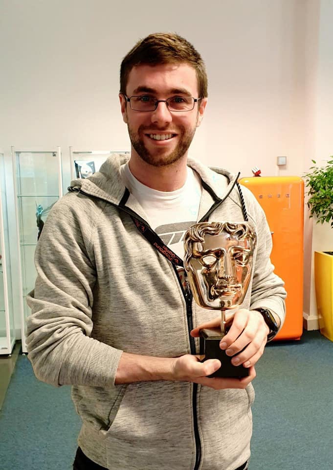 Adan Currey with the BAFTA for Forza Horizon 4