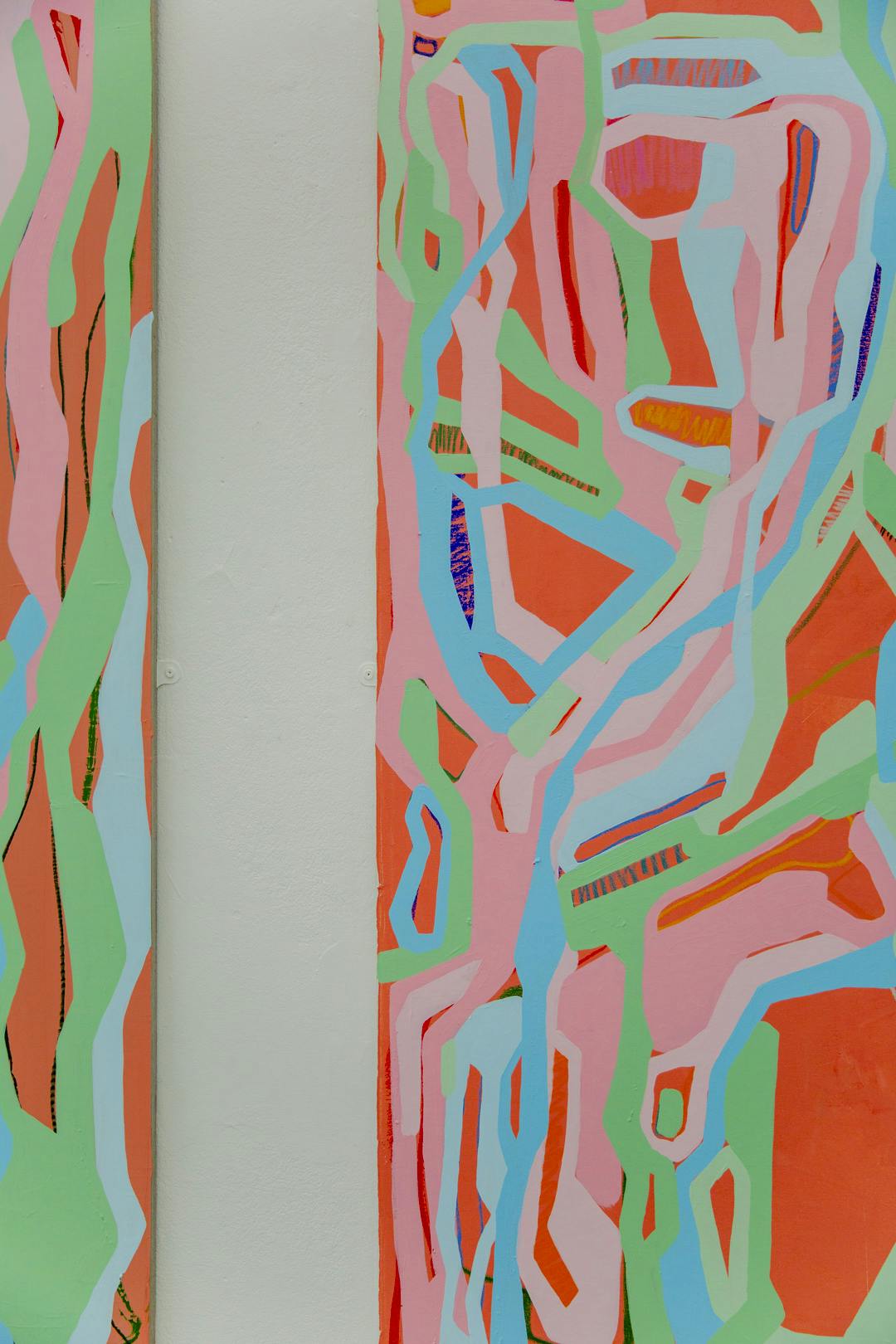 Image shows a close up shot of one of Ebony's paintings, featuring bright colours and swirling patterns