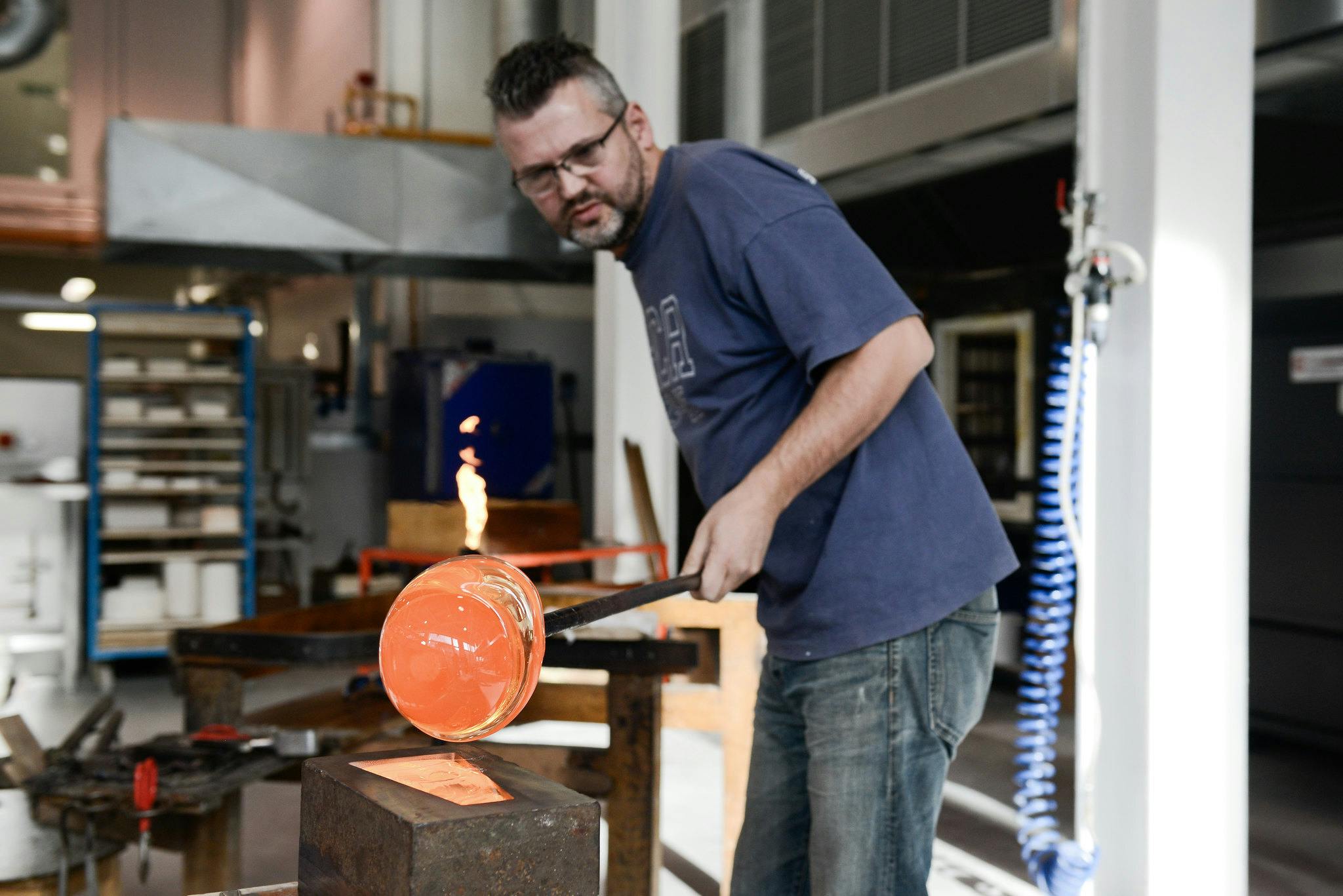 Ian Hankey blows hot glass in Plymouth College of Art