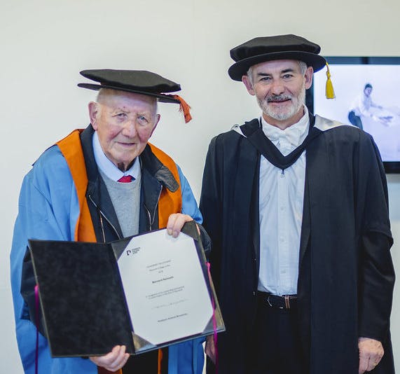 Bernard Samuels pictured with former Principal and Emeritus Professor Andrew Brewerton receives an Honorary Fellowship from Arts University Plymouth in 2018