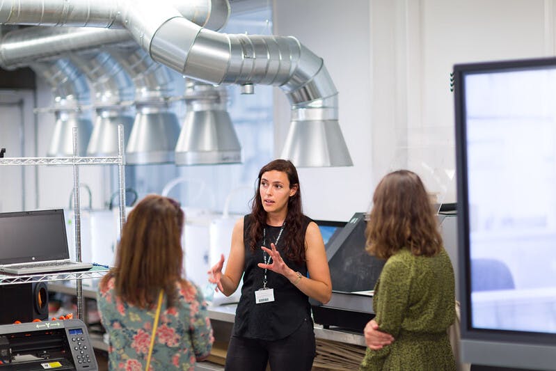 A member of staff chats to visitors in Fab Lab Plymouth at the Fab City 2021 event Photo by Ray Goodwin